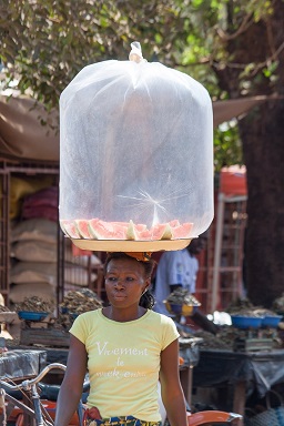 Young girl selling watermelons, Burkina Faso, West Africa