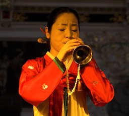 The korean musician Kim Kyeong-Ah playing a Taepyeongso. "Tanz- und Folkfestival" in Rudolstadt, Germany
